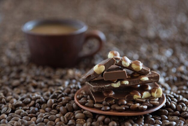 Coffee grains and black chocolate close up