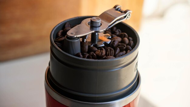 Photo coffee grinder and modern manual coffee grinder