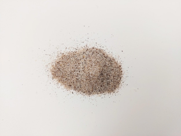 coffee grounds in white background
