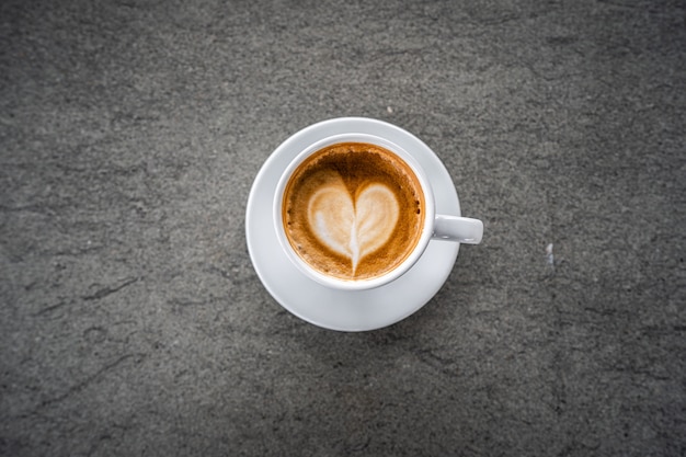 Foto caffè espresso di arte del latte del caffè in caffetteria
