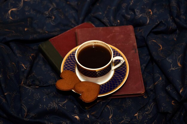 Coffee mug on the background of the wrinkled cloth