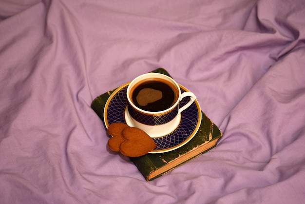 Coffee mug on the background of the wrinkled cloth