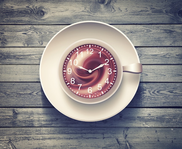 Photo coffee mug with clock on wooden surface