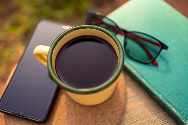 Coffee mugs in the backyard and morning sunshine.