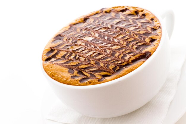 Coffee Napoleon in white cup on a white background.