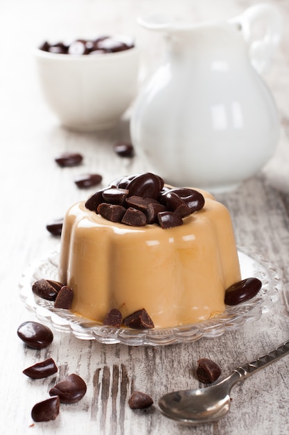 Coffee panna cotta with chocolate candies