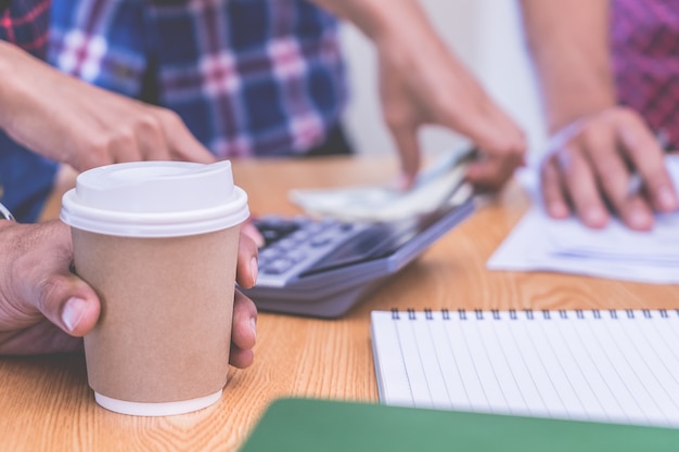 Coffee paper cup in a business start up meeting