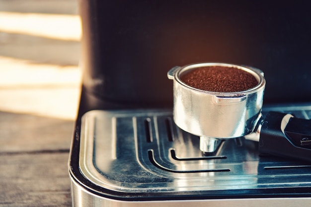 Coffee powder on coffee machine.