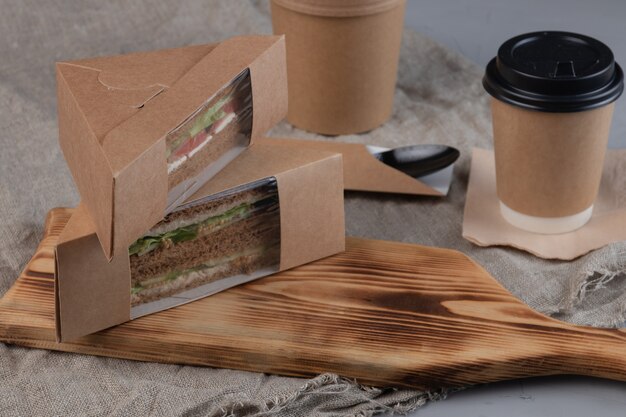 Coffee and sandwiches in craft box