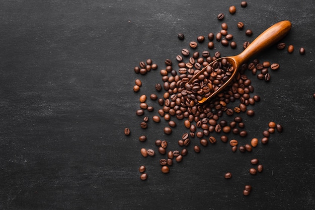 Coffee scoop with roasted beans