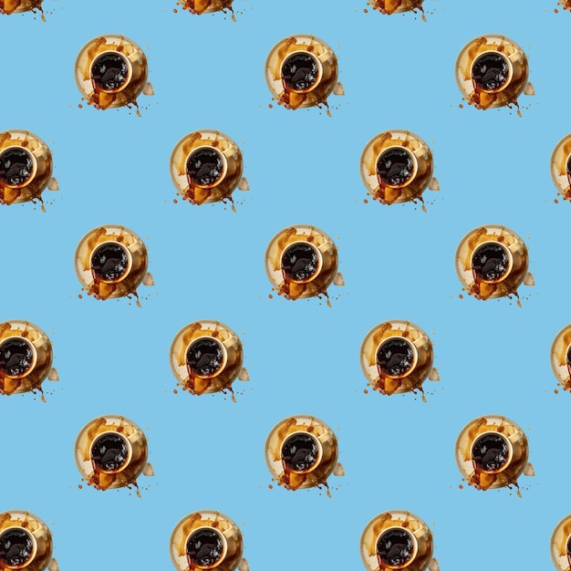 Coffee seamless pattern of a cup of espresso spilling out of a cup on blue Pop art flat lay