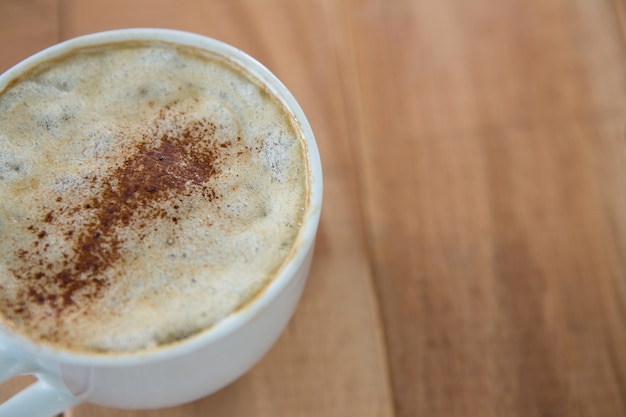 Photo coffee served in white cup