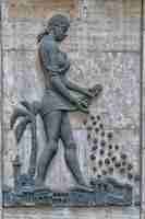 Photo coffee slave copper statue bas relief