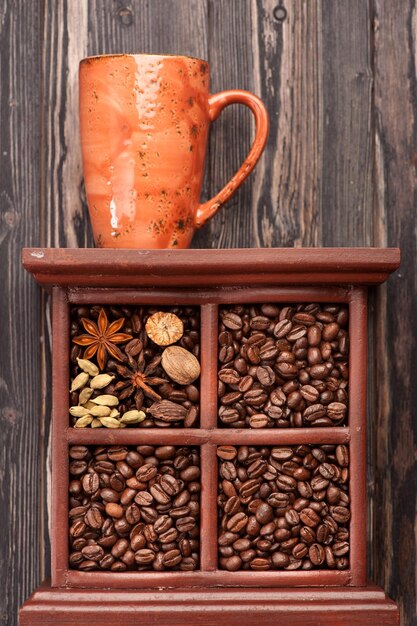 Coffee and spices in a wooden box Collage