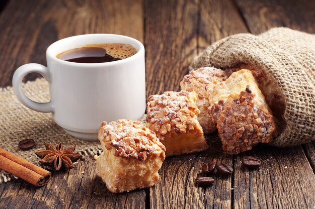 Coffee and sweet puff cookies with nuts