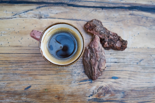 Coffee time on wooden background