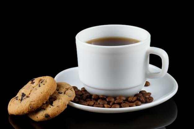 Coffee with cookies on a black background