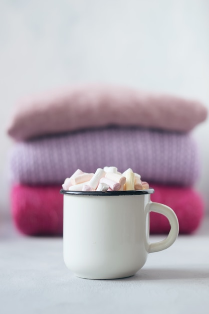 Coffee with marshmallows in white cup