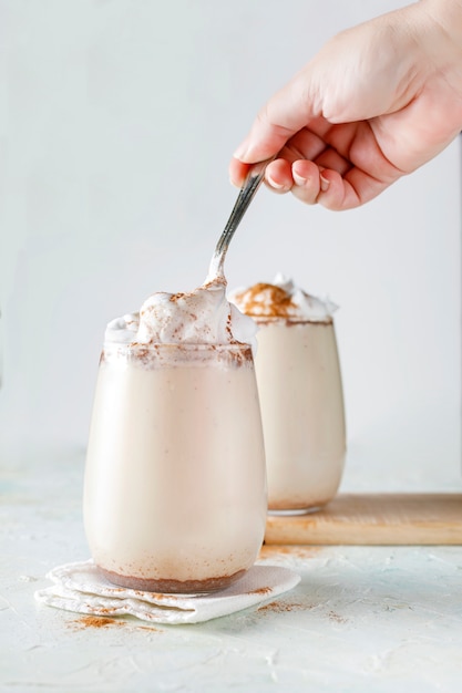 Coffee with milk, cream and cinnamon