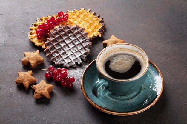 Coffee with waffles and sweets