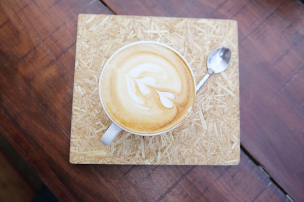 Coffee on wood background