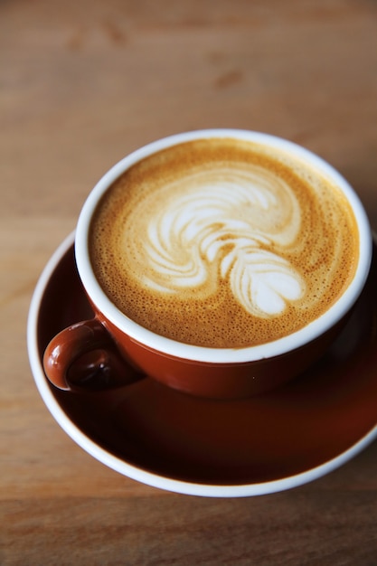 Coffee on wood background