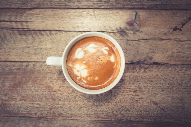 coffee on wood table background with space.