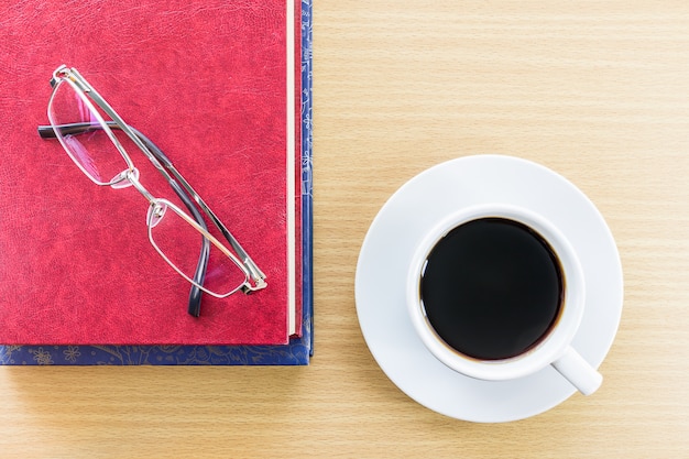 Coffee on a wood table and glasses