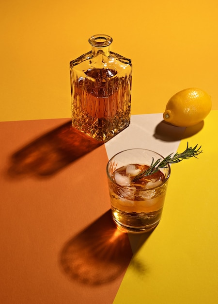 A cognac cocktail on orange colors background