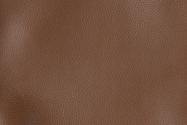 Foto fondo della superficie in pelle liscia testurizzata cognac