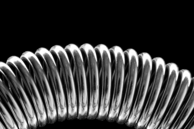 Coiled metal spring