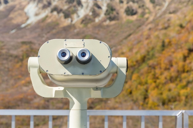 Photo coin operated binocular viewer in natural landscape