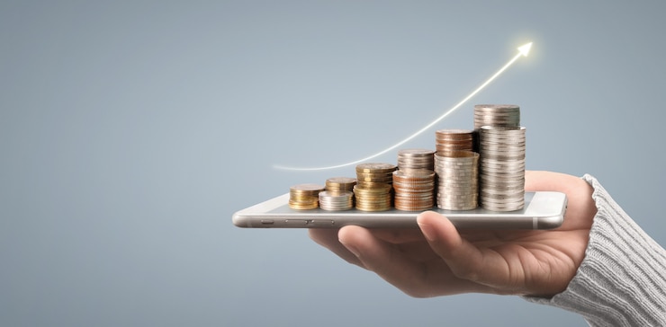 Photo coin and wealth concept. loads of money on glass representing digital tablet