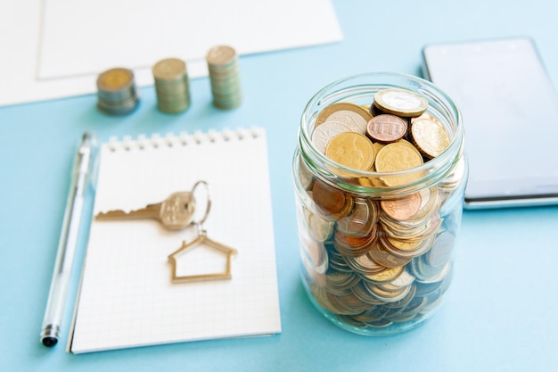 Photo the coins are stored in a glass jar to accumulate finances