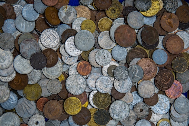 Coins background. Different coins from different countries.