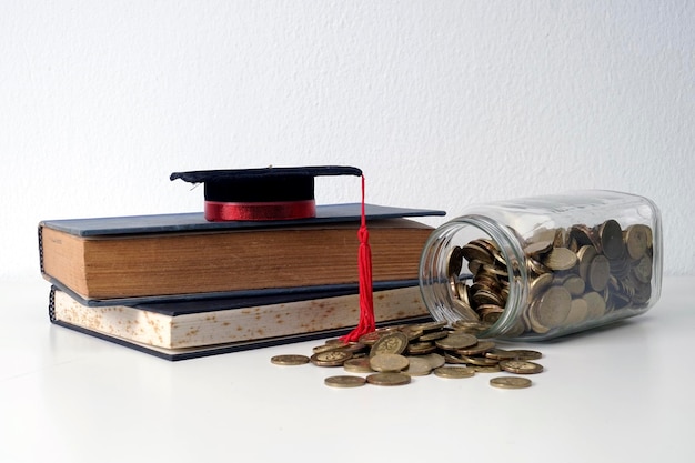 Coins and books on table