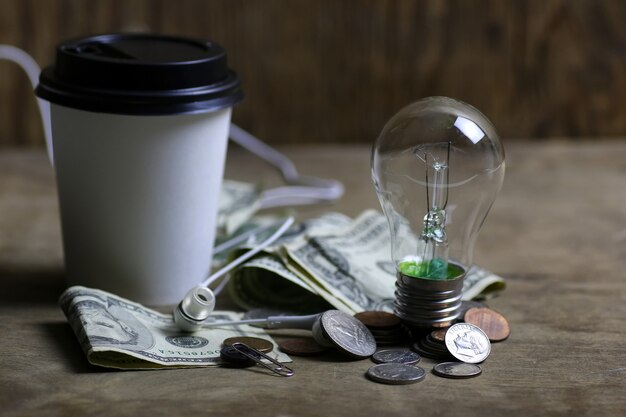 Photo coins and crumpled money tungsten lamp filament