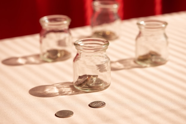 Photo coins in glass jar. money savings concept
