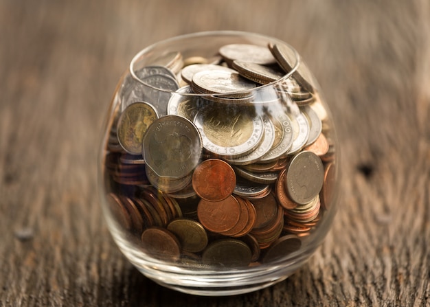 coins in glass jar 