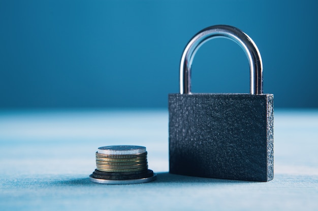 Coins and lock on the table