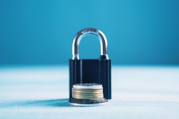 Coins and lock on the table