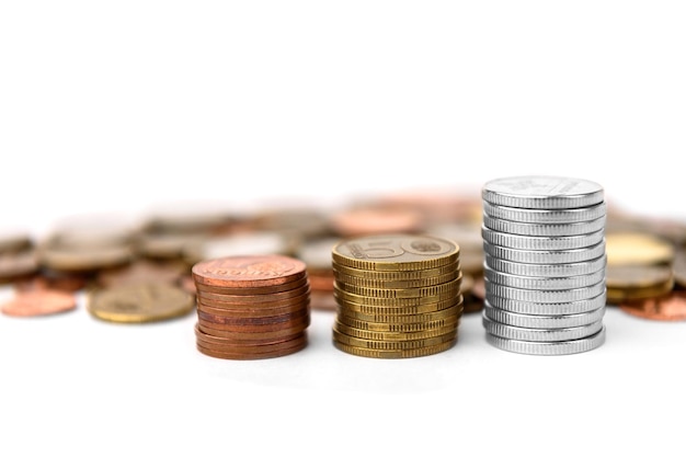 Coins stacked on a white background Money saving concept