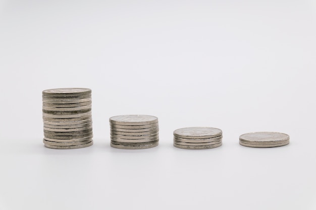 Photo coins stacked on white background