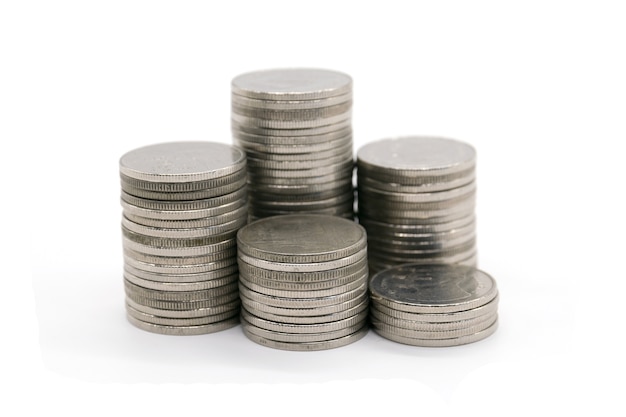 coins stacked on white background