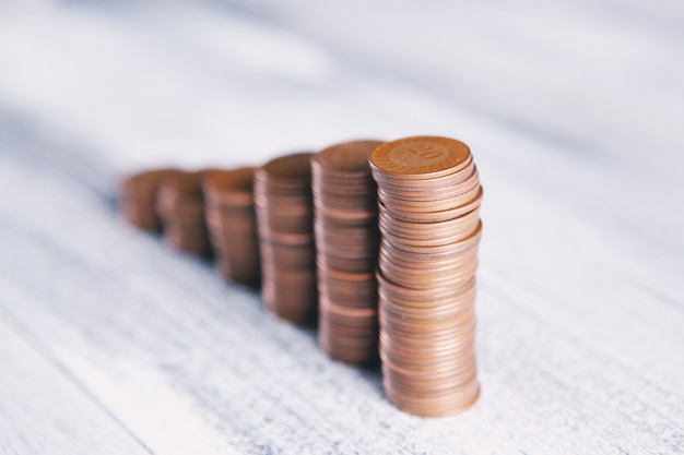 Coins on the table in the form of a growing graph