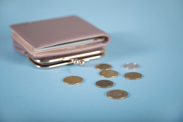 Coins and wallet on the table