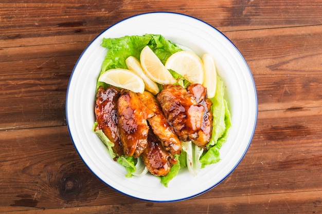 Cola chicken wings on plate