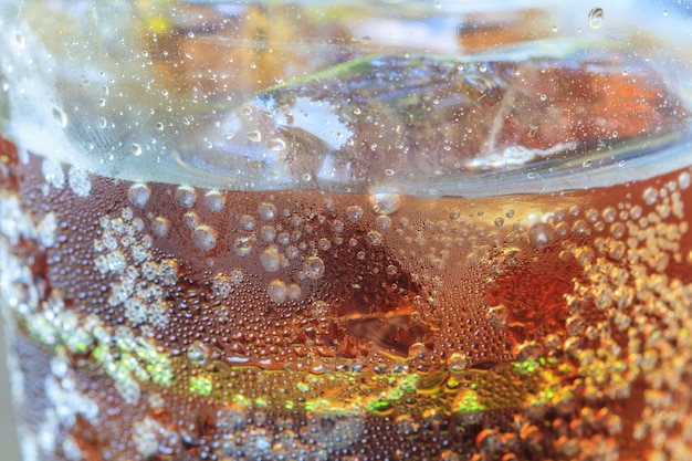 Cola with ice in cup