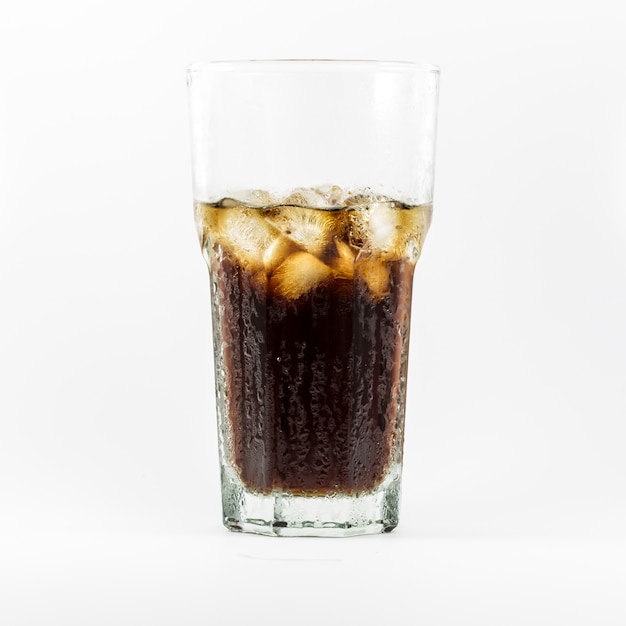 Photo cola with ice in glasses on white