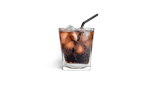 Cola with ice in a transparent glass isolated.